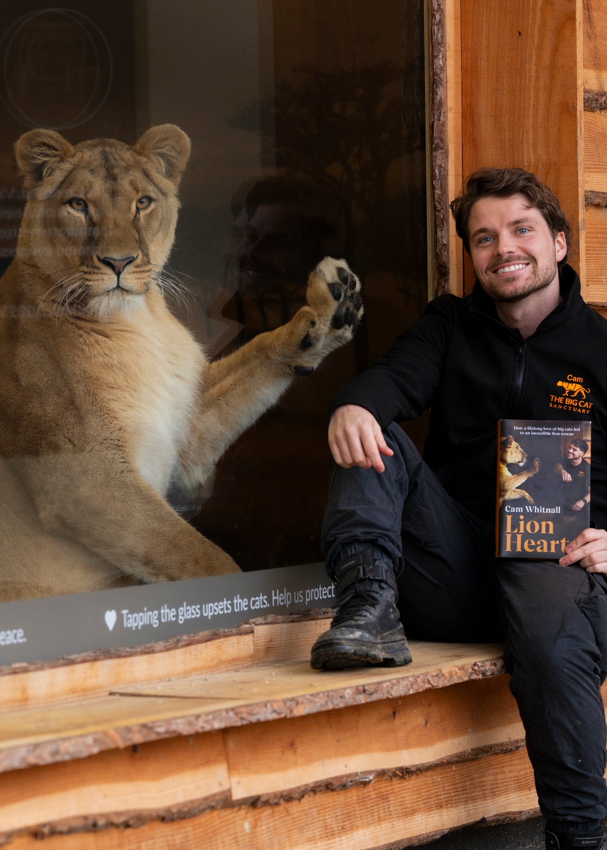 A bedroom overlooking tigers and birds